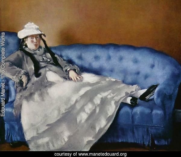 Portrait of the woman on a blue sofa
